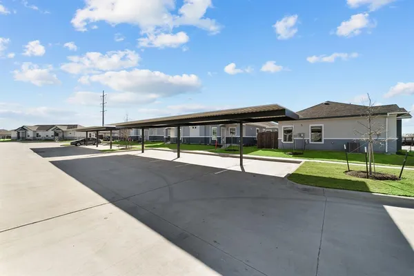 a view of swimming pool with a yard