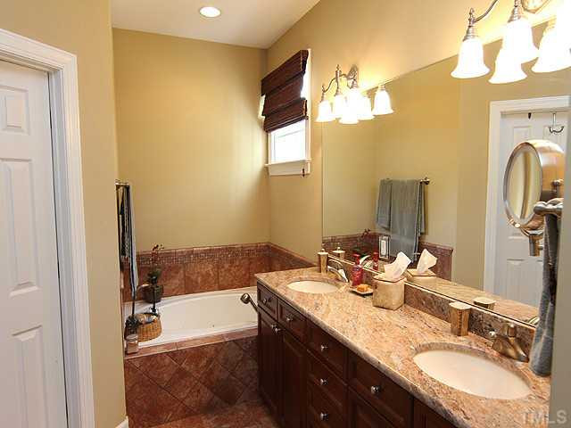 1623 Weatherford Circle Raleigh, NC 27604 - Photo 11 of 25 Double vanities, granite counters and jetted tub in the master bath Master Bath/Spa