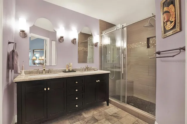 a view of living room filled with furniture and staircase
