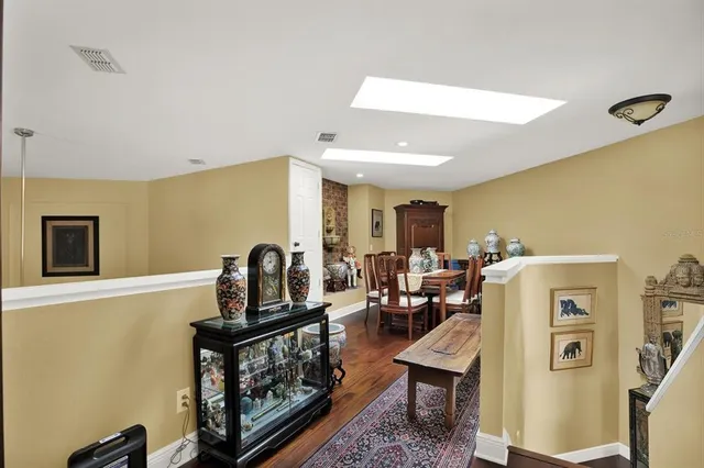 a bedroom with bed and window