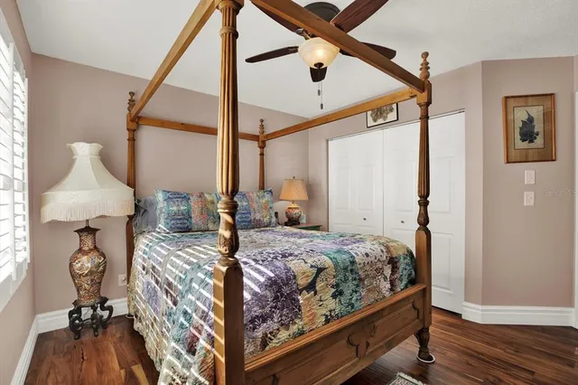 a balcony with table and chairs