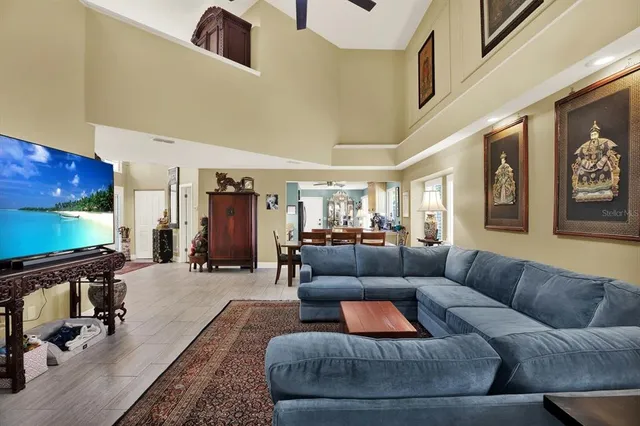 a view of a dining room with furniture window and outside view