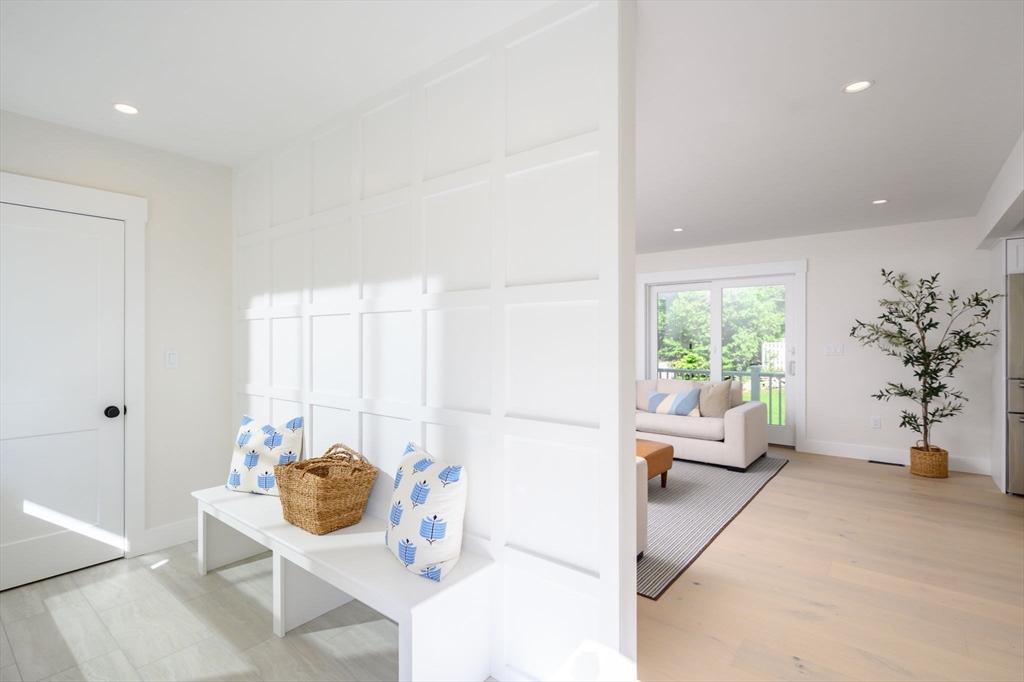 3 Patriots Way Hingham, MA 02043 - Photo 14 of 39 a living room with furniture and a potted plant