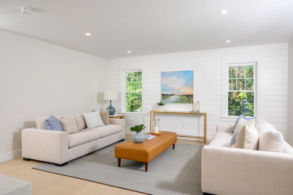3 Patriots Way Hingham, MA 02043 - Photo 15 of 39 a living room with furniture and a large window