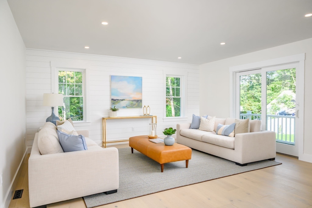 3 Patriots Way Hingham, MA 02043 - Photo 16 of 39 a living room with furniture and a large window