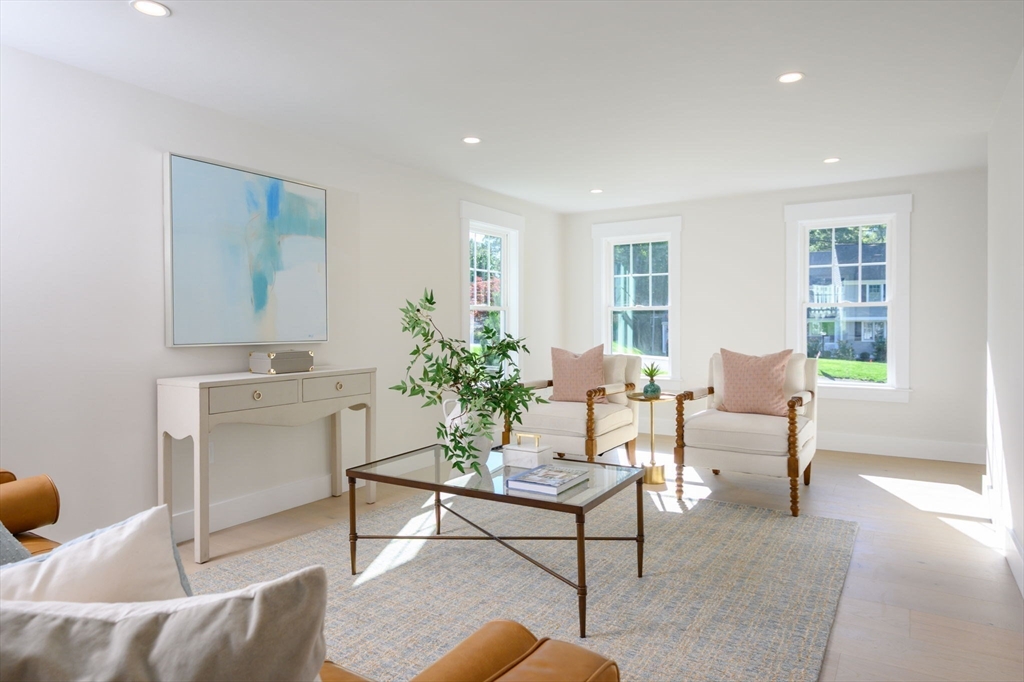 3 Patriots Way Hingham, MA 02043 - Photo 17 of 39 a living room with furniture and a potted plant