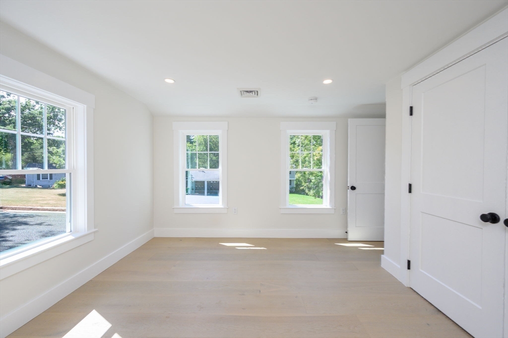 3 Patriots Way Hingham, MA 02043 - Photo 25 of 39 a view of an empty room with a window