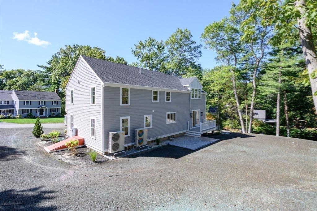 3 Patriots Way Hingham, MA 02043 - Photo 37 of 39 a view of a house with backyard and sitting area