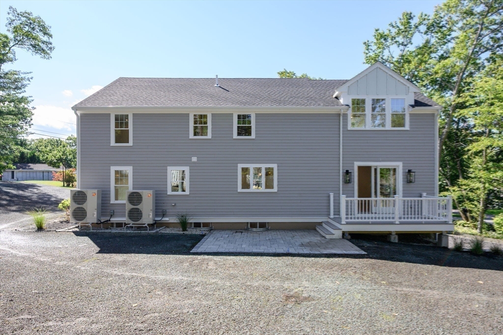 3 Patriots Way Hingham, MA 02043 - Photo 38 of 39 a front view of a house with a yard
