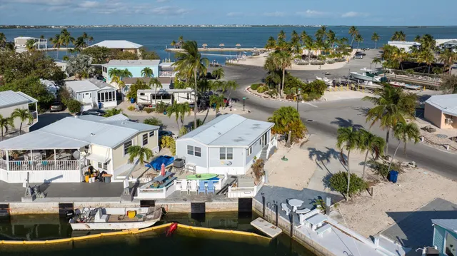 an aerial view of a building with outdoor seating