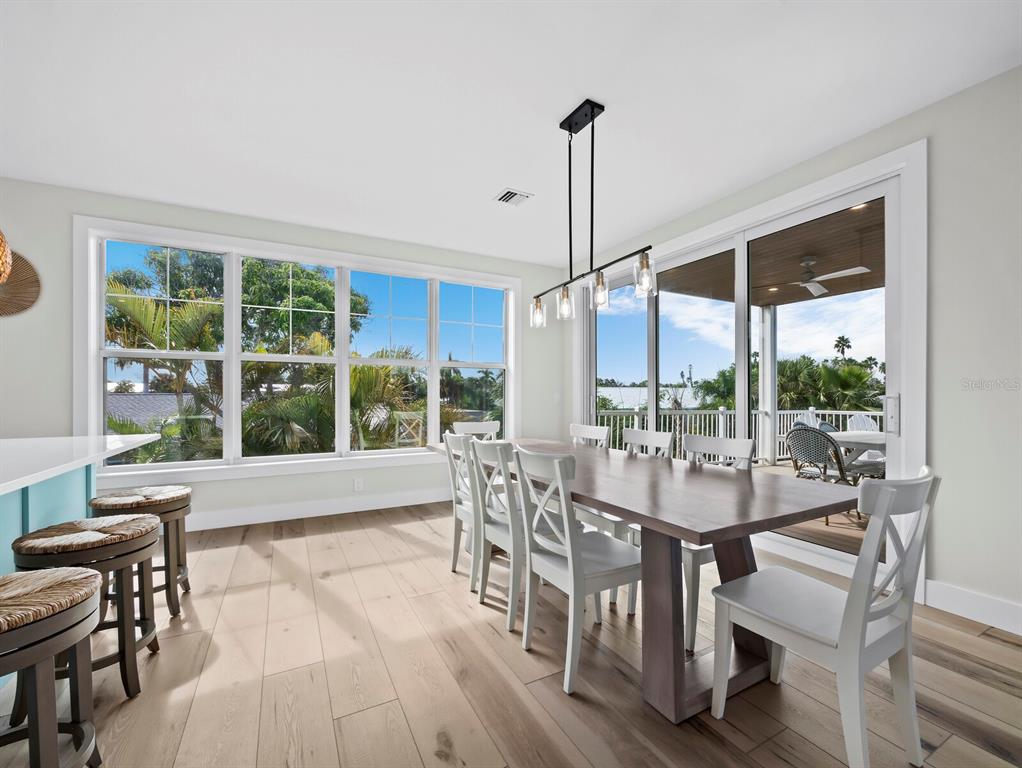 630 Companion Way Longboat Key, FL 34228 - Photo 17 of 66 a view of a dining room with furniture window and outside view