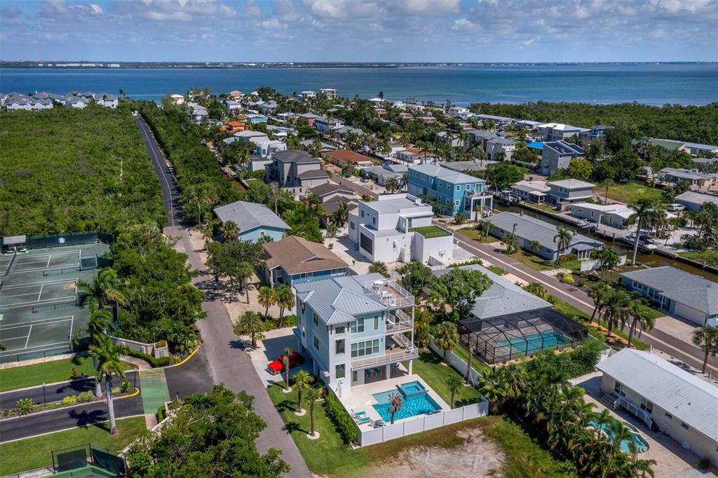 630 Companion Way Longboat Key, FL 34228 - Photo 46 of 66 an aerial view of residential houses with outdoor space