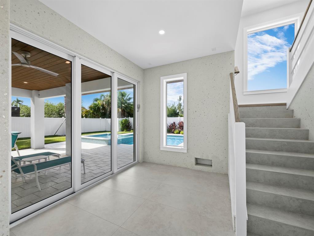 630 Companion Way Longboat Key, FL 34228 - Photo 5 of 66 a view of an entryway with a floor to ceiling window and an entryway