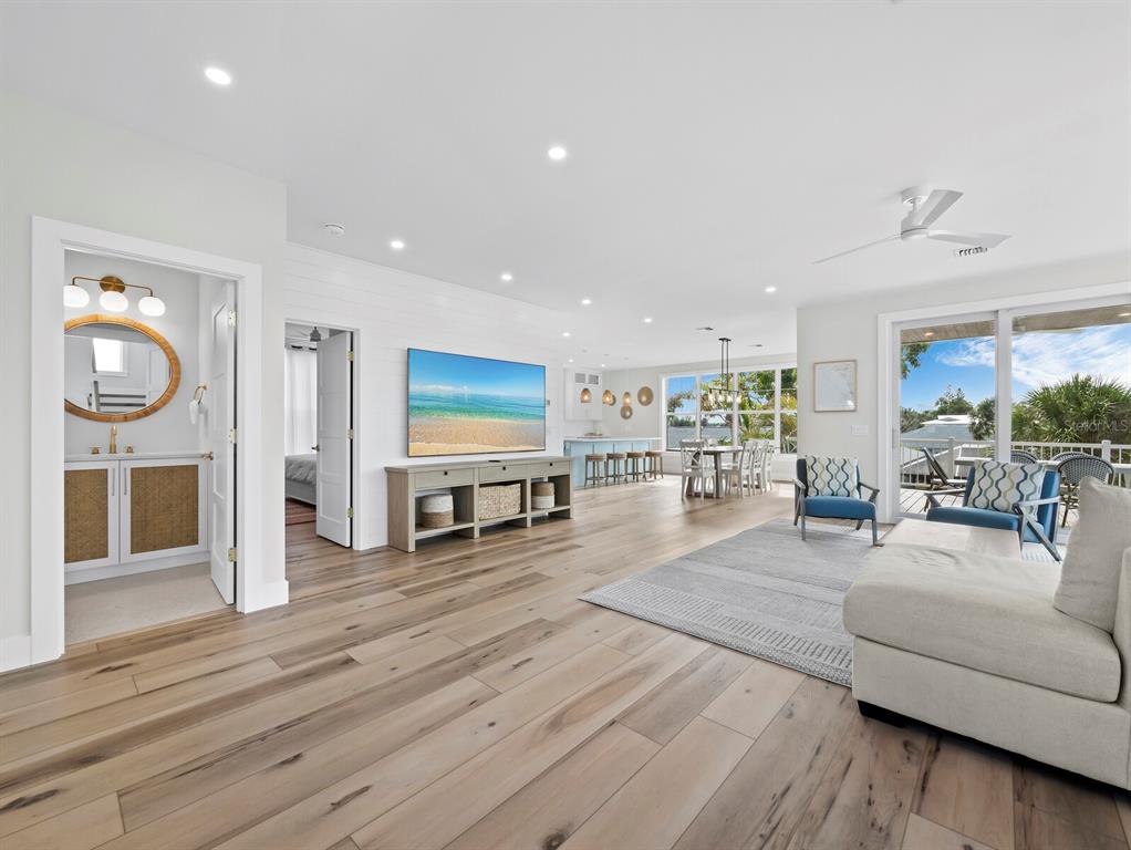 630 Companion Way Longboat Key, FL 34228 - Photo 7 of 66 a living room with furniture and kitchen view