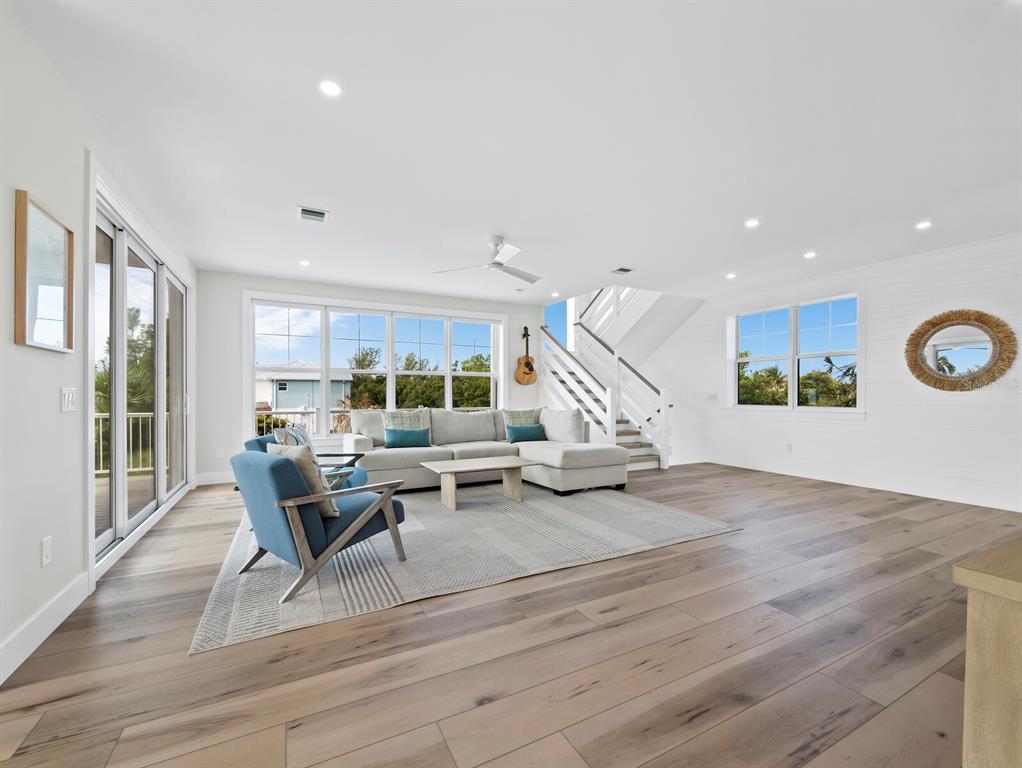 630 Companion Way Longboat Key, FL 34228 - Photo 10 of 66 a living room with furniture and a large window