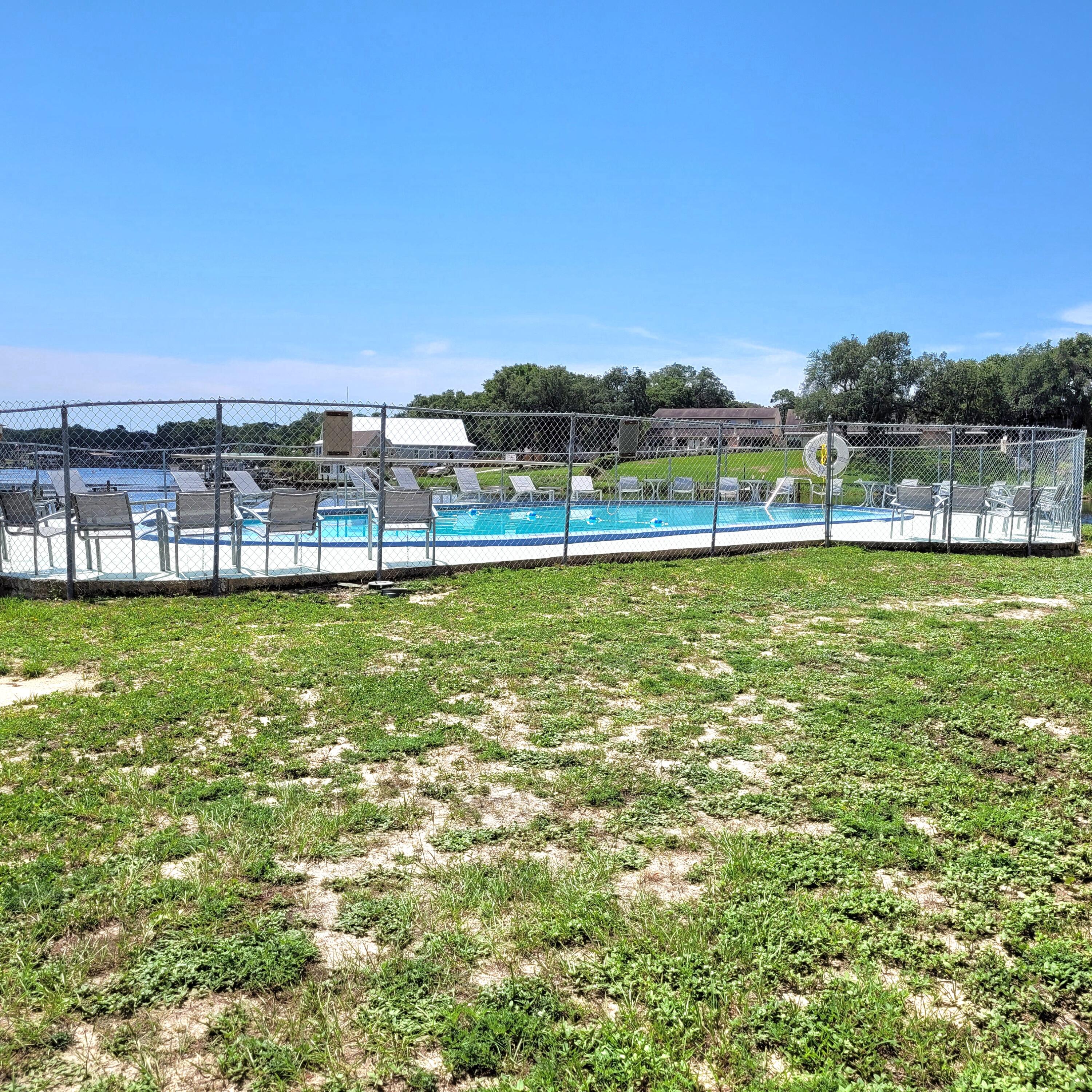 210 Pelham Road, Unit 208C Fort Walton Beach, FL 32547 - Photo 14 of 17 a view of a lake with houses