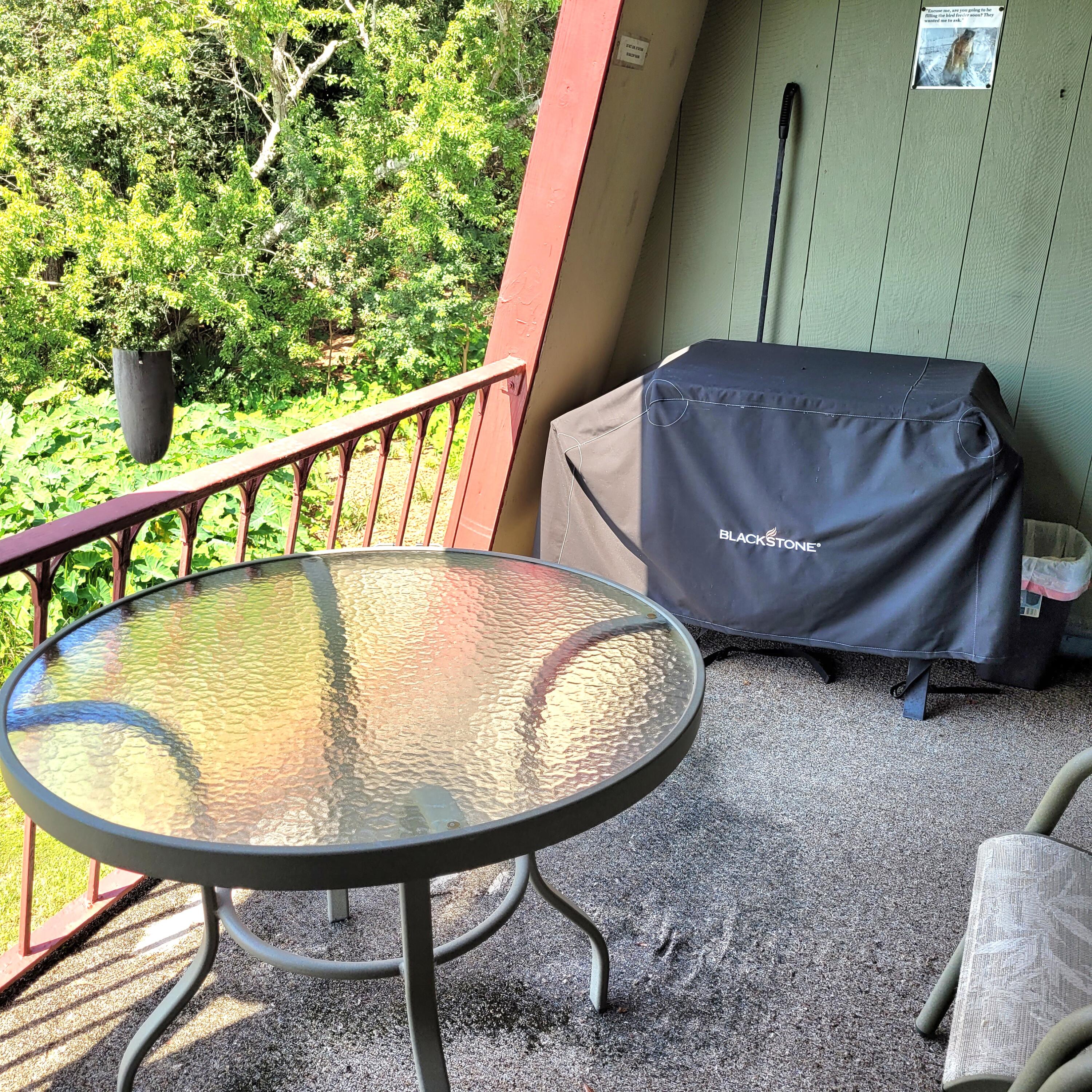 210 Pelham Road, Unit 208C Fort Walton Beach, FL 32547 - Photo 6 of 17 a view of a chairs and table in the balcony