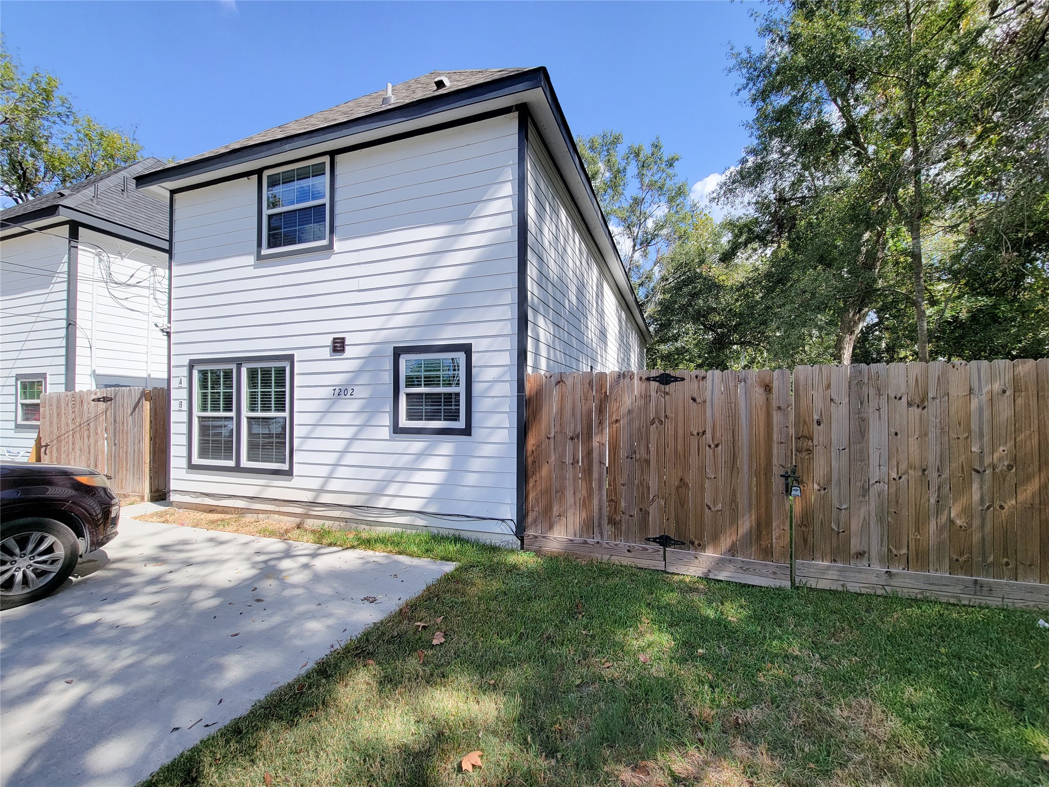 7202 Sandle Street, Unit A Houston, TX 77088 - Photo 2 of 29 a view of a house with backyard and sitting area