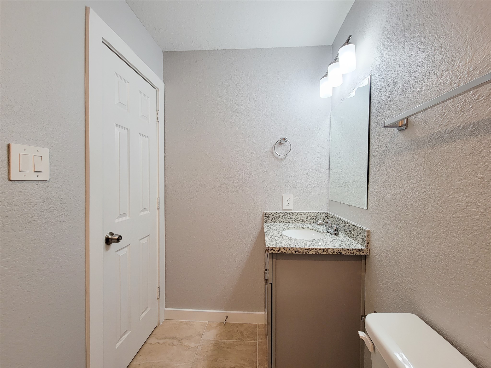 7202 Sandle Street, Unit A Houston, TX 77088 - Photo 21 of 29 a bathroom with a sink toilet and shower