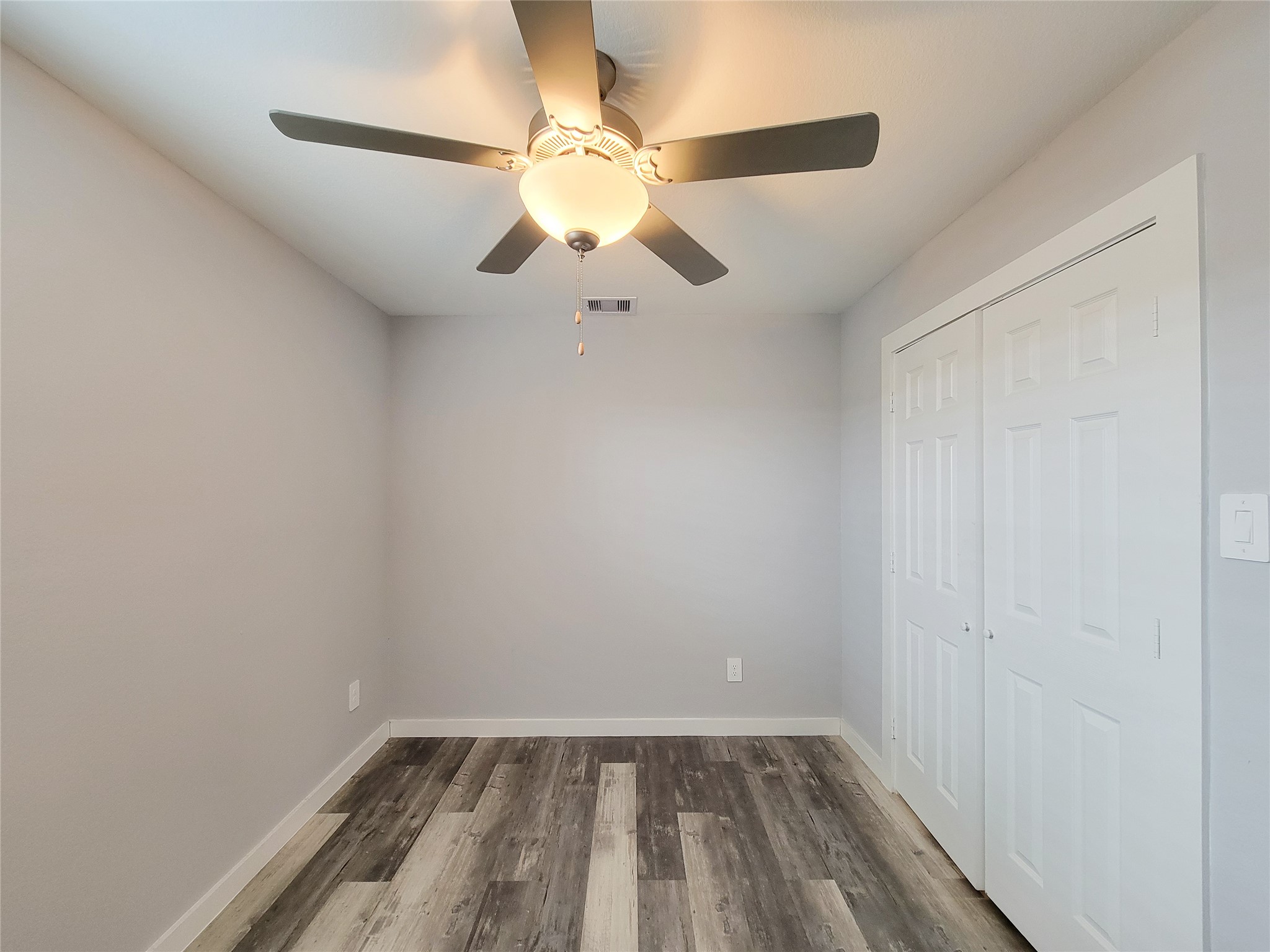 7202 Sandle Street, Unit A Houston, TX 77088 - Photo 23 of 29 wooden floor in an empty room