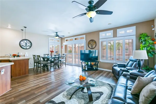 a kitchen with granite countertop a sink stove and cabinets