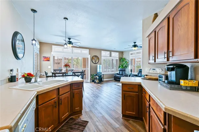 a view of a dining room with furniture and a window