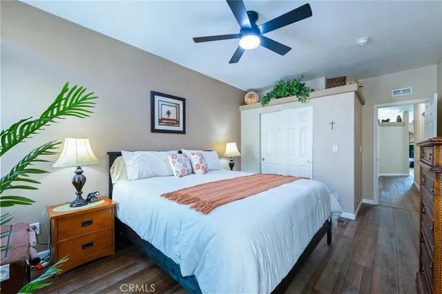a bathroom with a granite countertop sink and a bathtub