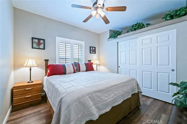 a view of a patio with table and chairs and potted plants