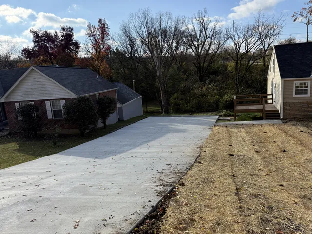 a view of a backyard of the house
