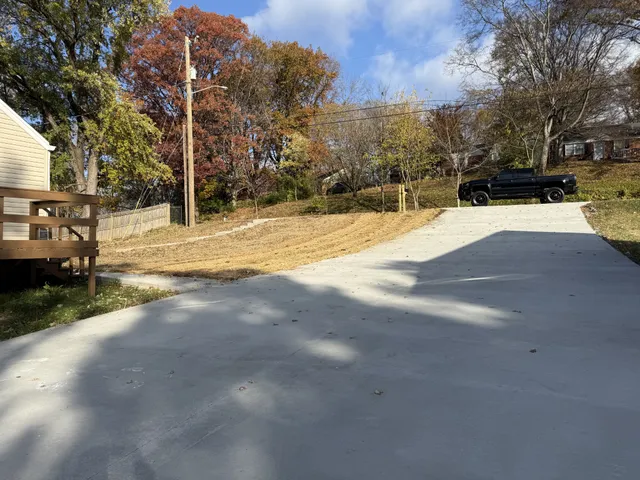 a view of road with trees