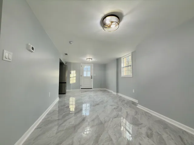 a view of a livingroom and a window
