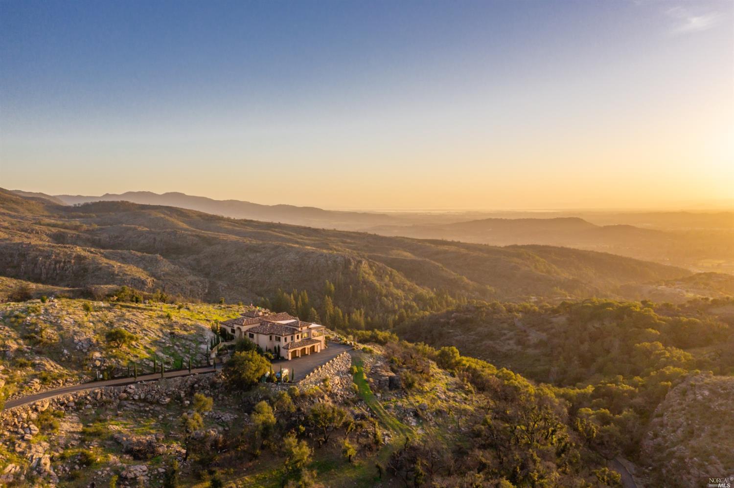 a view of mountain view with mountains in the background