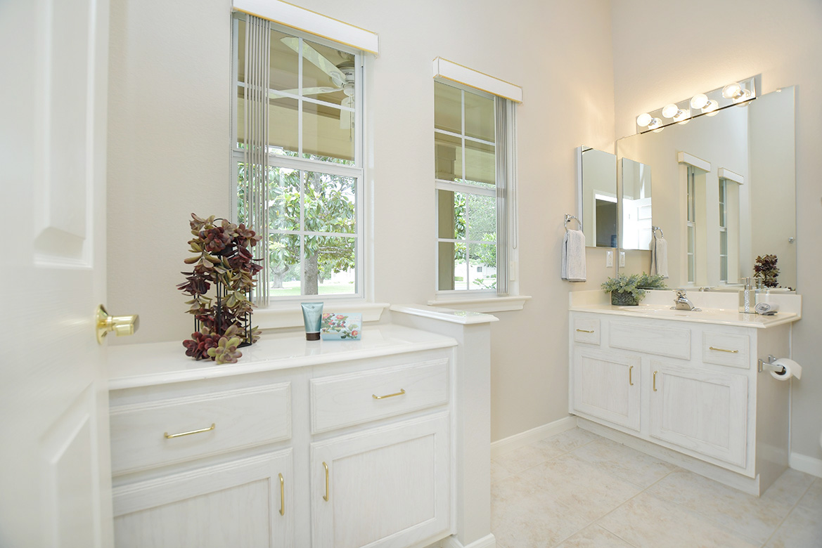 114 Lone Star Drive Georgetown, TX 78633 - Photo 26 of 30 A charming guest bath with windows looking out front is mere steps from the guest bedroom.