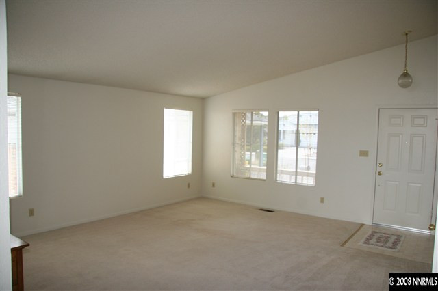 1622 Calusa Lane Reno, NV 89523 - Photo 4 of 9 a view of an empty room with a window