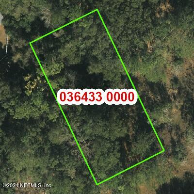 0 9th Avenue Jacksonville, FL 32208 - Photo 7 of 9 a sign broad on the side of the road