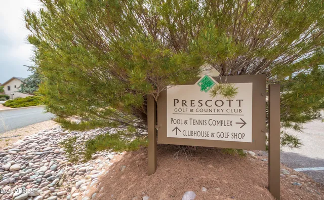 a sign on the side of a road