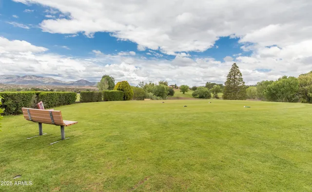 a view of a lake with a big yard