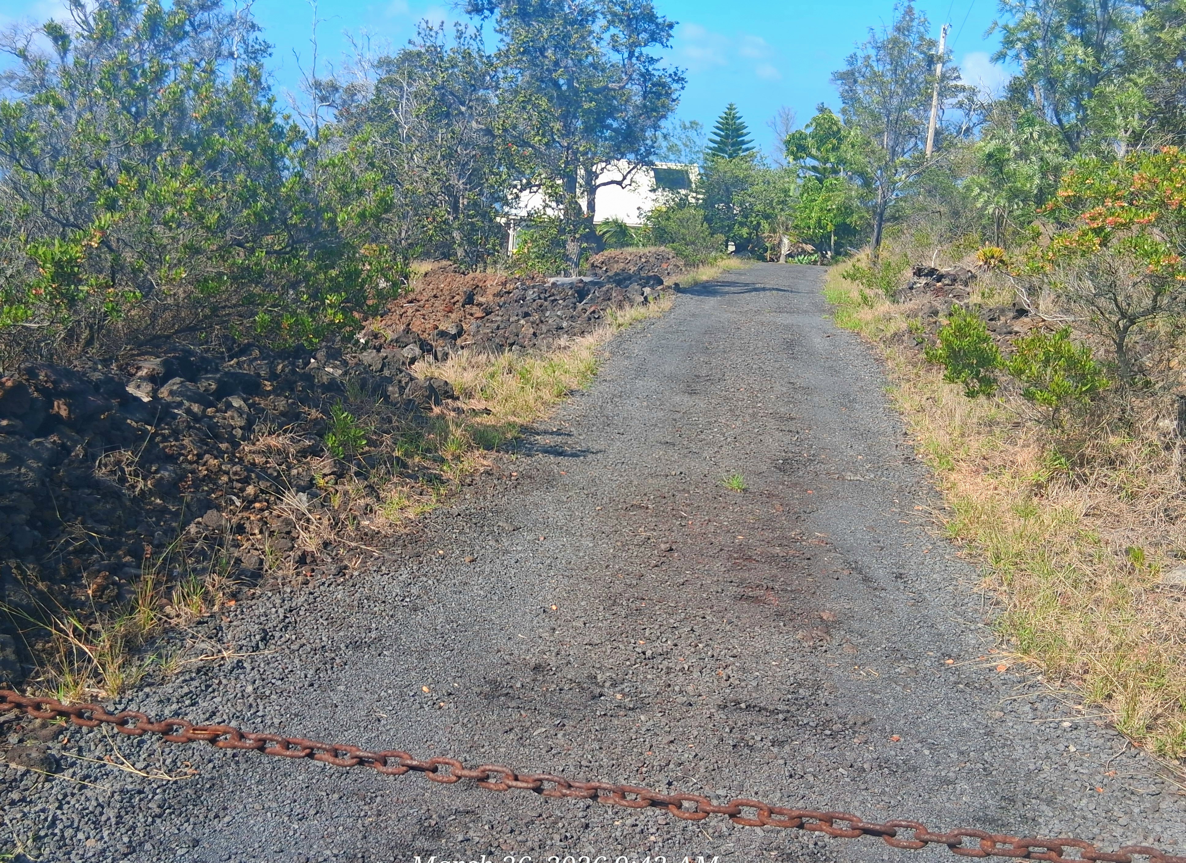 92-8221 Reef Parkway Ocean View, HI 96704 - Photo 2 of 20 a view of a yard with a tree
