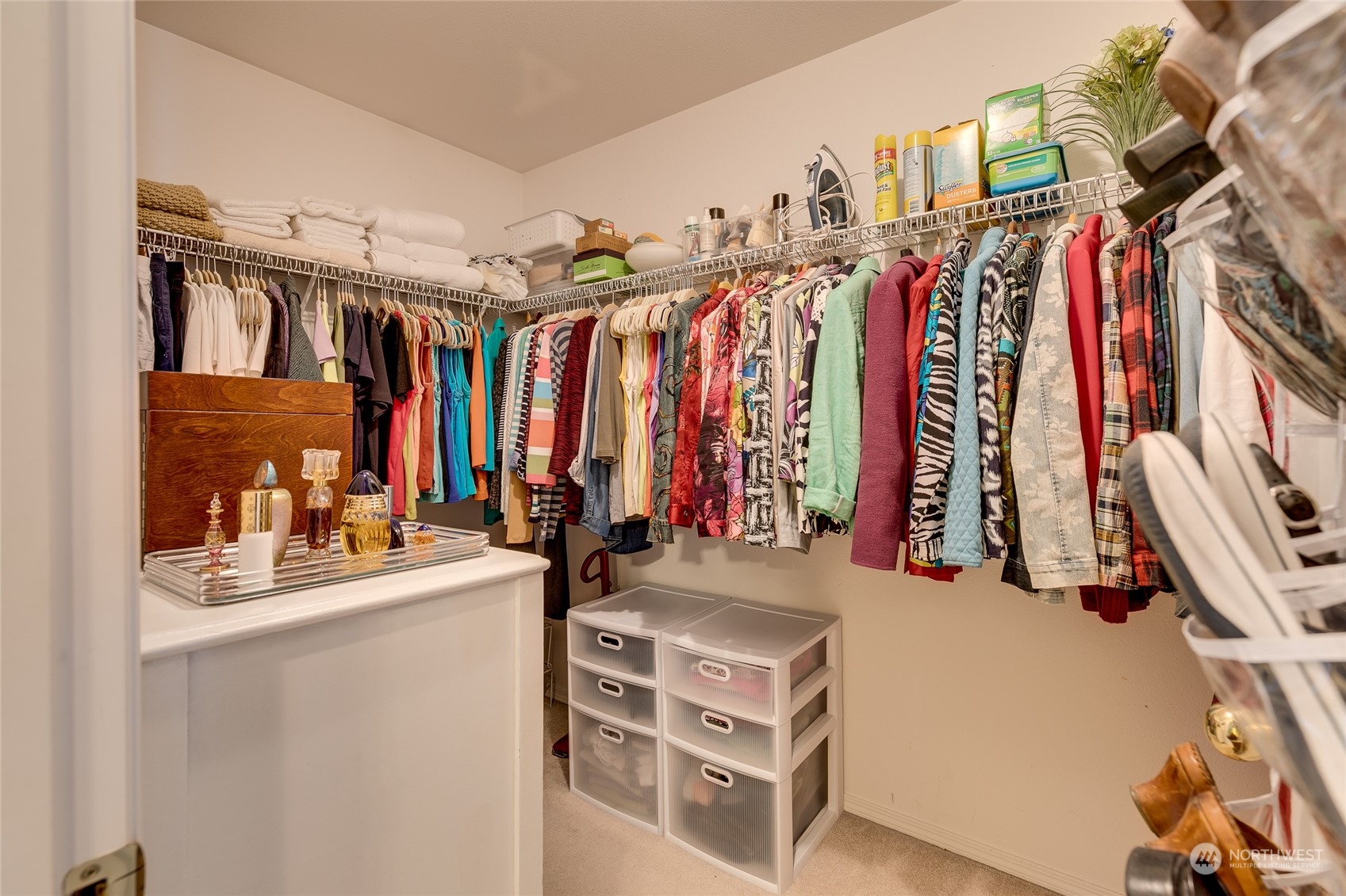 1430 West Casino Road, Unit 213 Everett, WA 98204 - Photo 15 of 31 a view of walk in closet with clothes