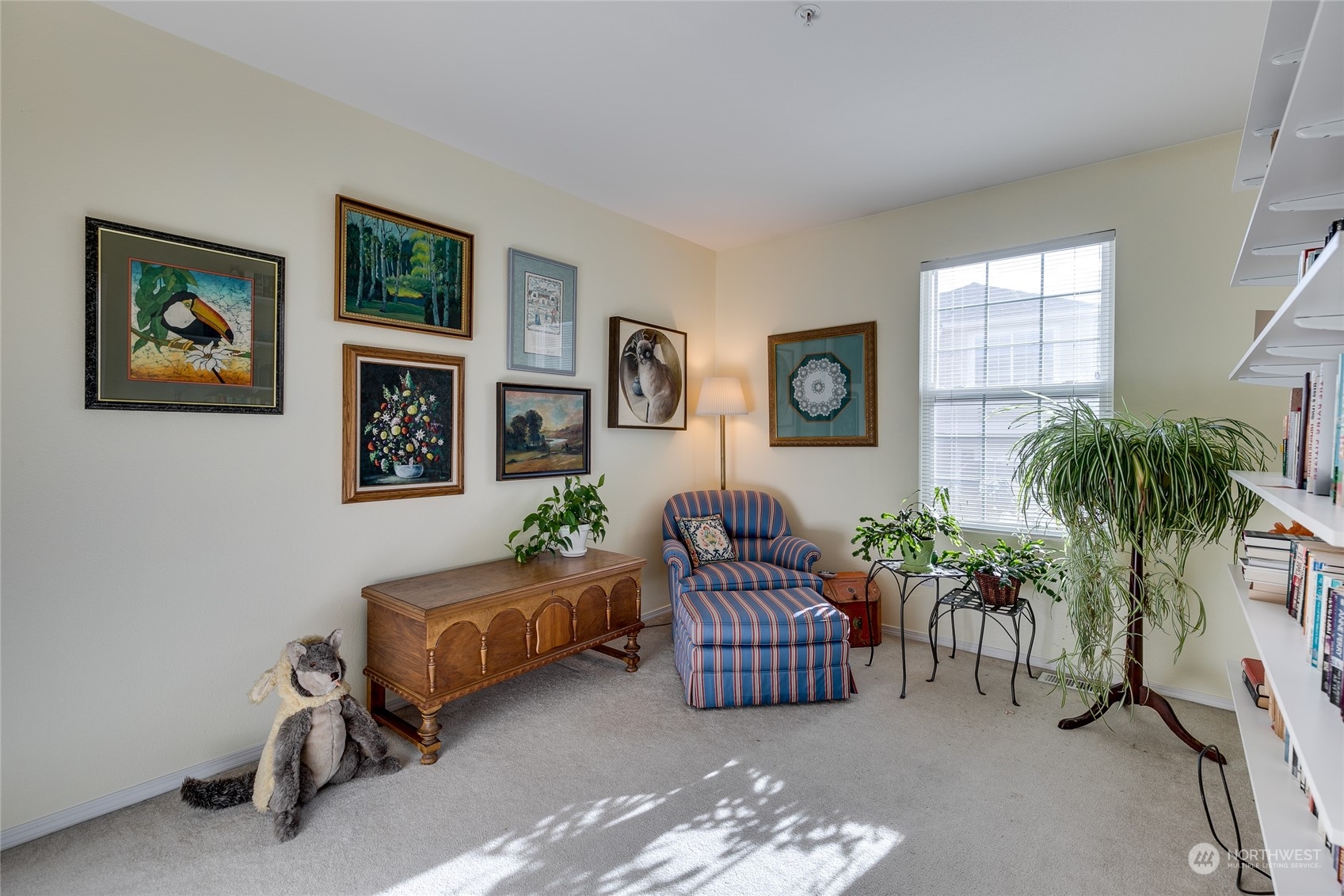 1430 West Casino Road, Unit 213 Everett, WA 98204 - Photo 18 of 31 a living room with furniture and a potted plant