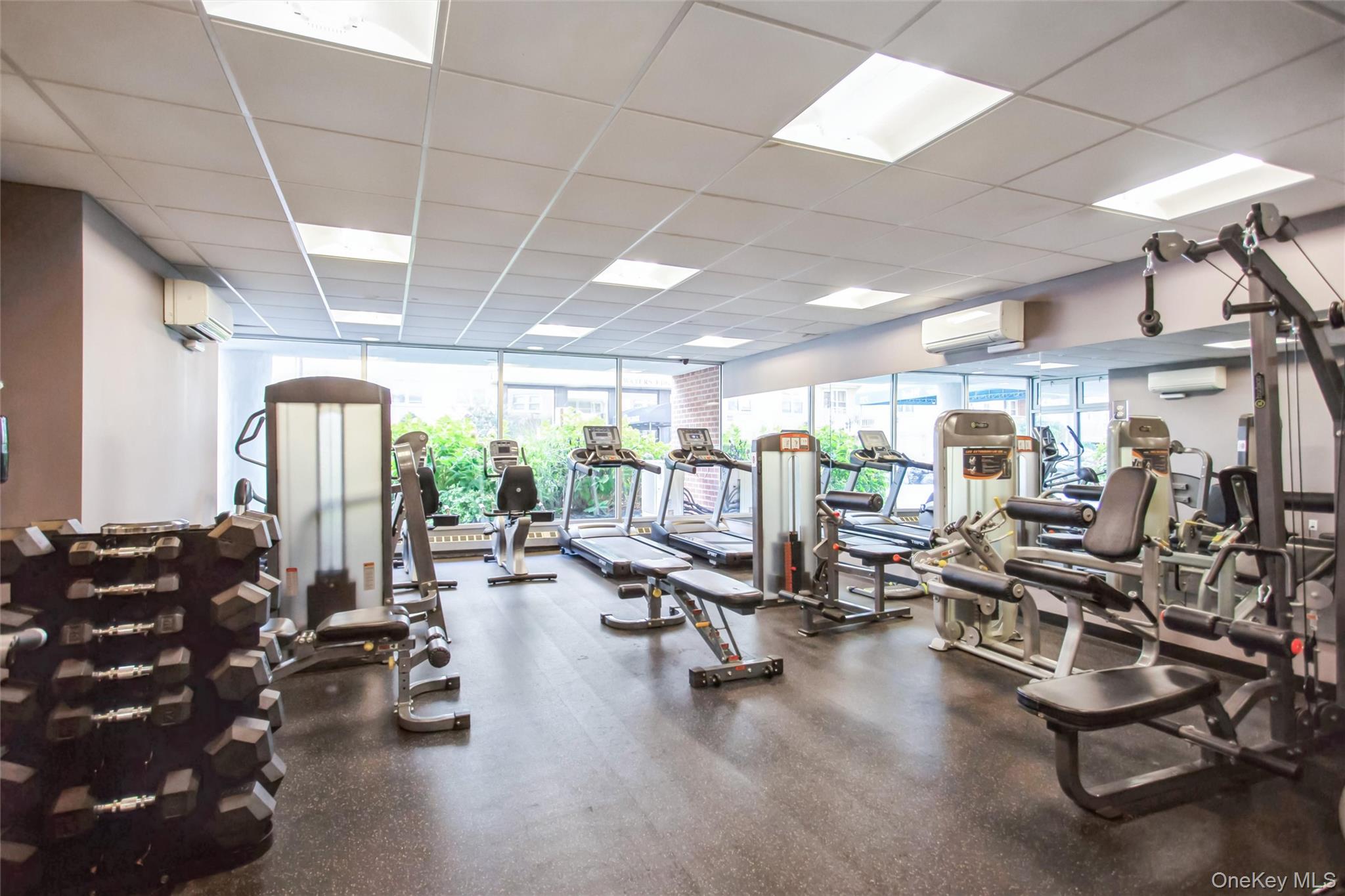 711 Shore Road, Unit 2C Long Beach, NY 11561 - Photo 21 of 27 a view of a room with gym equipment