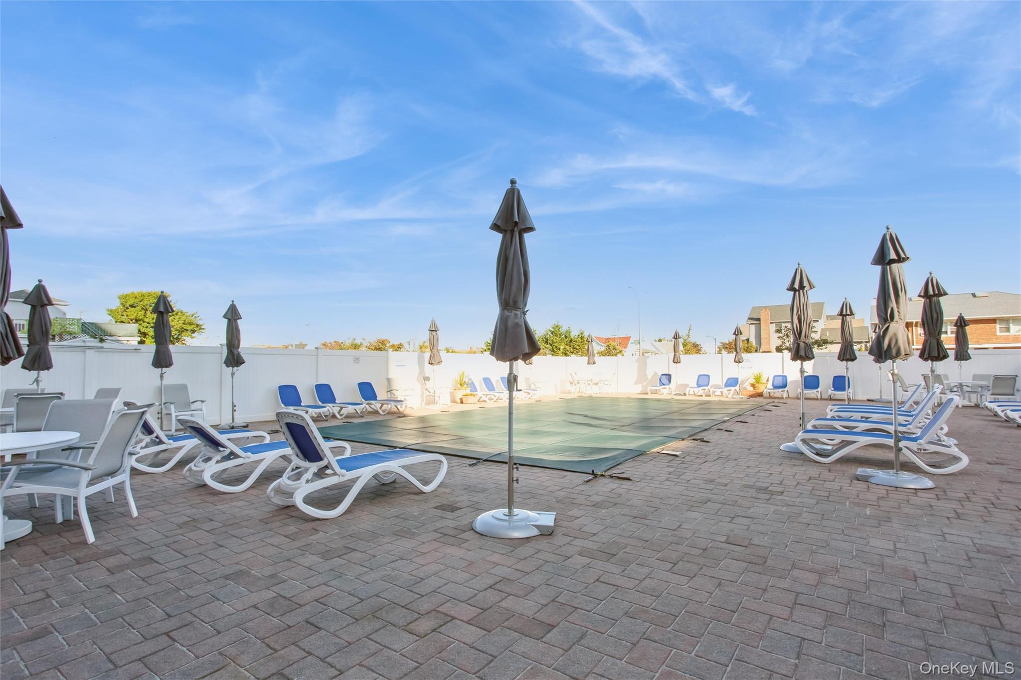 711 Shore Road, Unit 2C Long Beach, NY 11561 - Photo 22 of 27 a view of a terrace with chairs