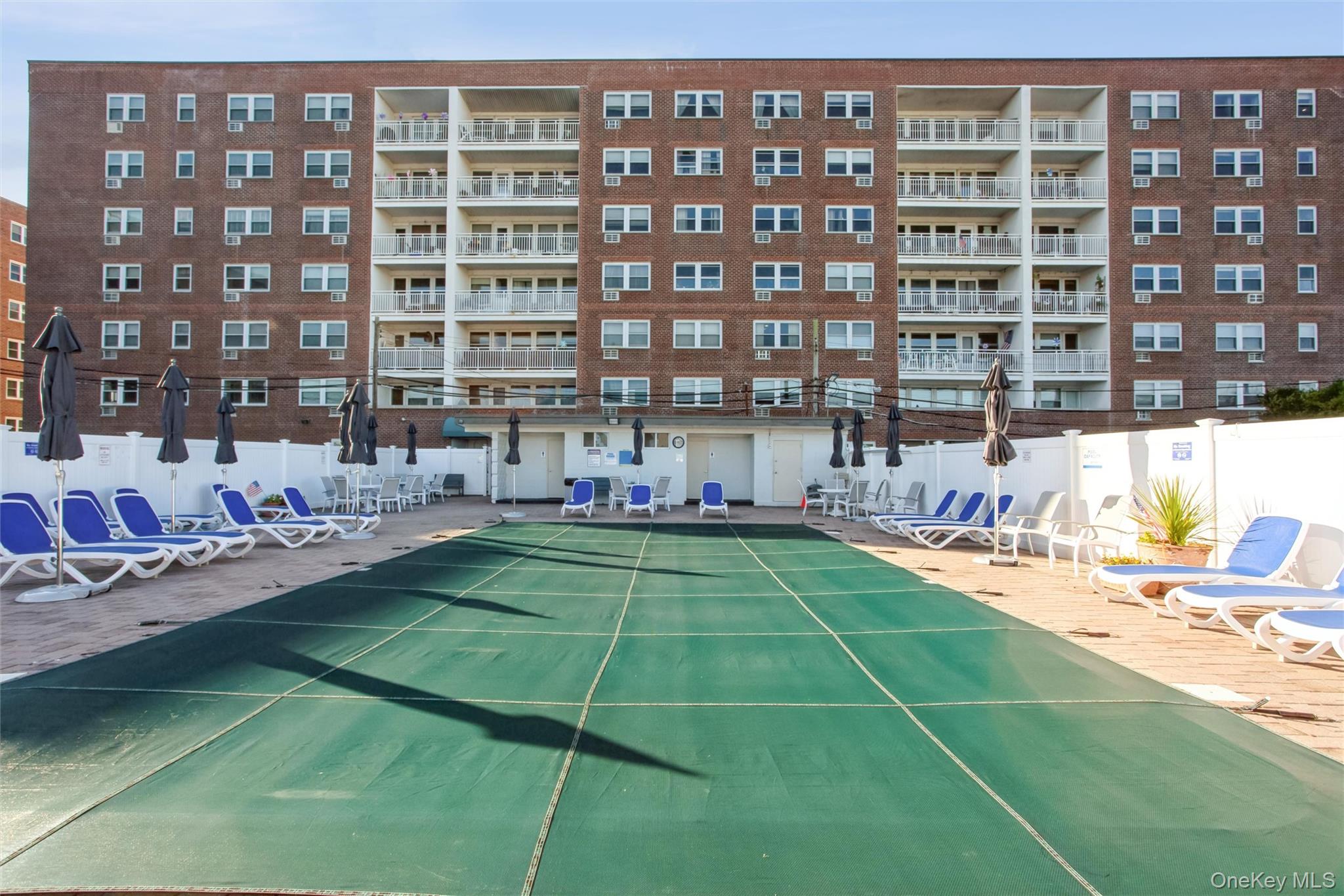 711 Shore Road, Unit 2C Long Beach, NY 11561 - Photo 23 of 27 a view of building with outdoor space