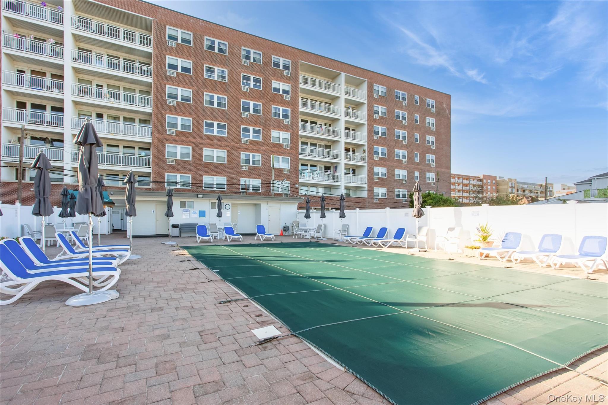 711 Shore Road, Unit 2C Long Beach, NY 11561 - Photo 24 of 27 a view of building with outdoor space