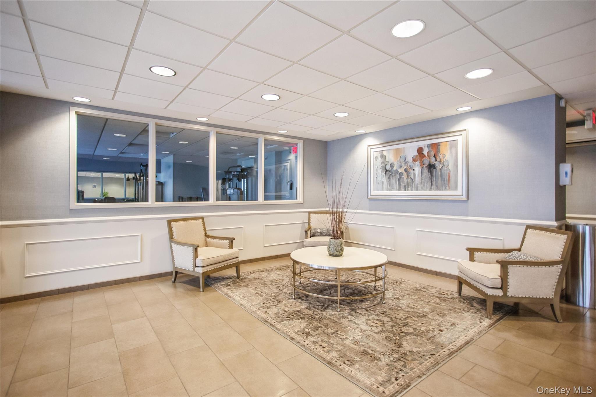 711 Shore Road, Unit 2C Long Beach, NY 11561 - Photo 25 of 27 a living room with furniture and a wooden floor