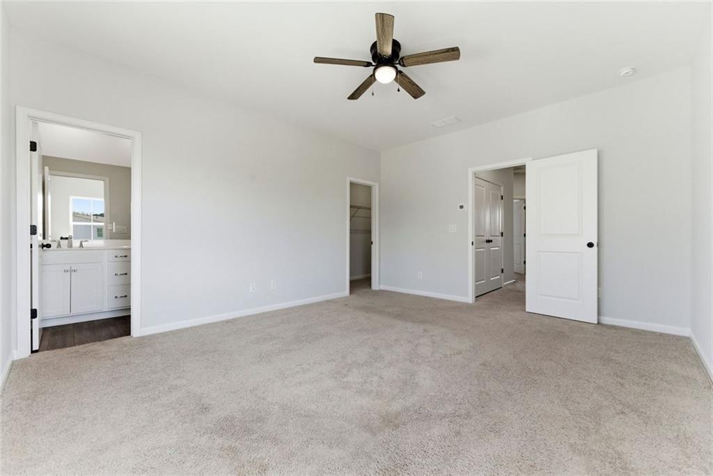 1200 Marlo Way Acworth, GA 30102 - Photo 18 of 34 a view of empty room with ceiling fan