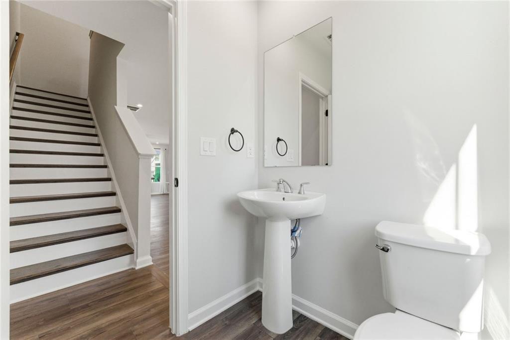 1200 Marlo Way Acworth, GA 30102 - Photo 25 of 34 a bathroom with a sink toilet and shower