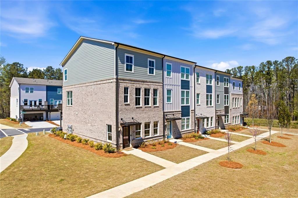 1200 Marlo Way Acworth, GA 30102 - Photo 30 of 34 a front view of a building with a garden