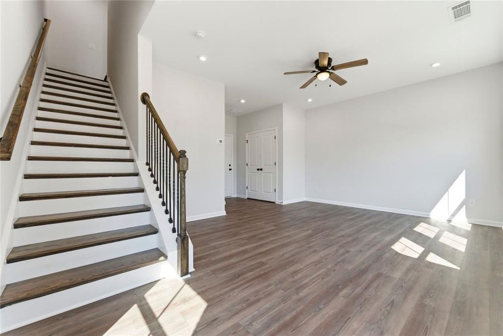 1200 Marlo Way Acworth, GA 30102 - Photo 3 of 34 wooden floor in an empty room with a window