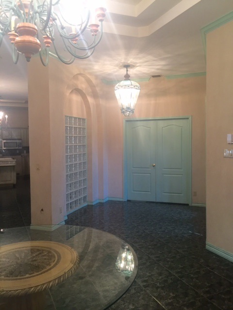 110 Tamarack Loop Laredo, TX 78045 - Photo 2 of 13 a view of a livingroom with an empty space and a kitchen